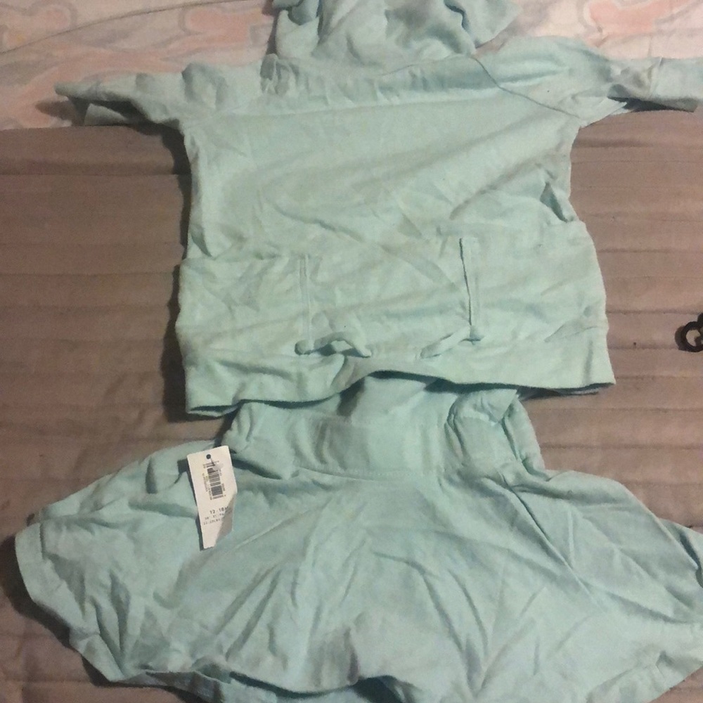 Girls light turquoise  skirt and turtleneck shirt